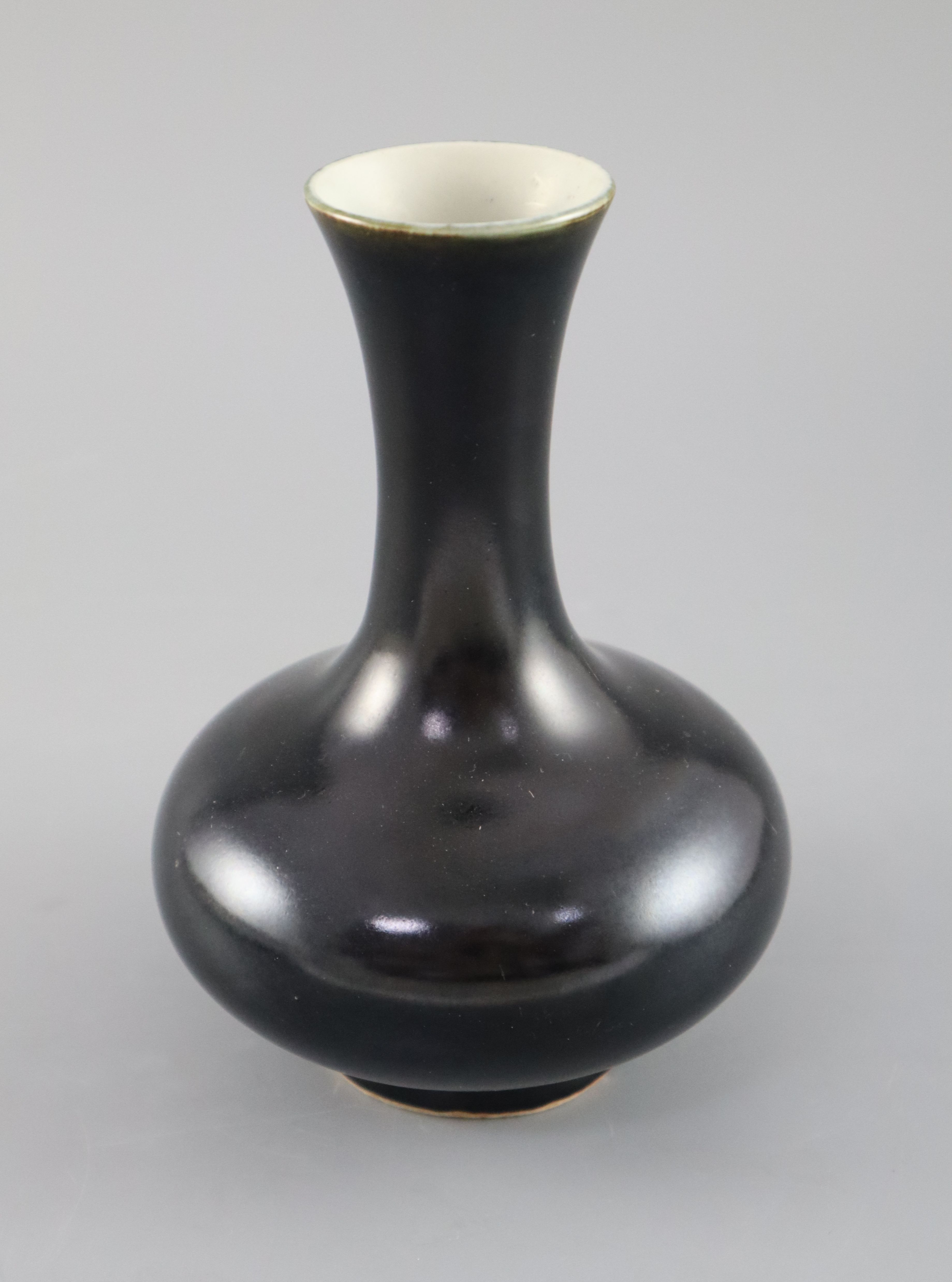 A Chinese black glazed bottle vase, possibly 18th century, 17cm high